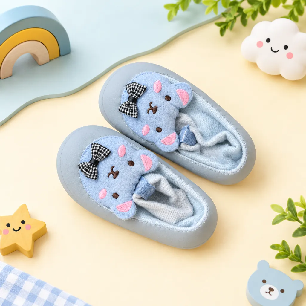 Pastel Mouse Slippers in a Dreamy Nursery Flat Lay.webp
