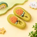 Whimsical Carrot Slippers Still Life.webp